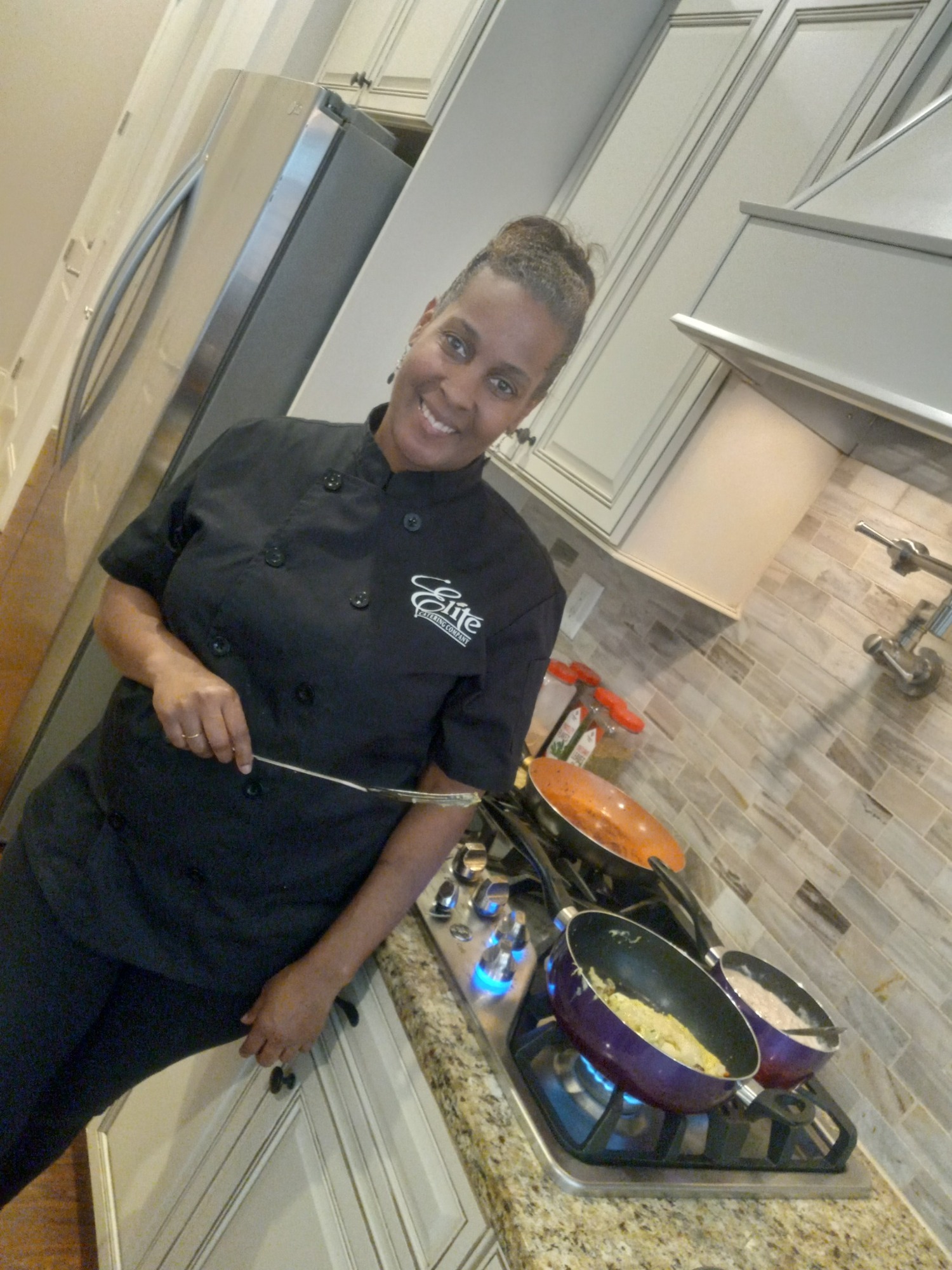 Robyn Witherspoon preparing catered meals